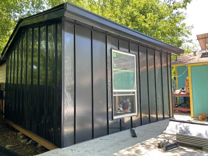 Black standing seam metal wall panels for Metal Roof Installation in Birch Run