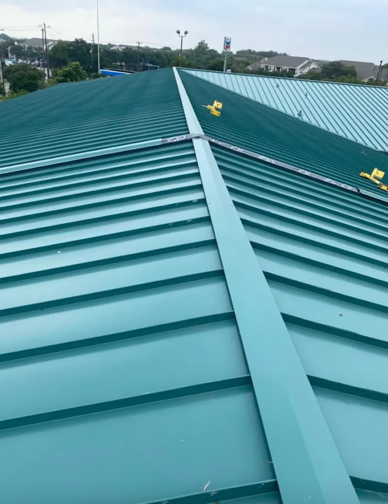 Green commercial metal roof ridge and valley for Metal Roof Repair in Birch Run